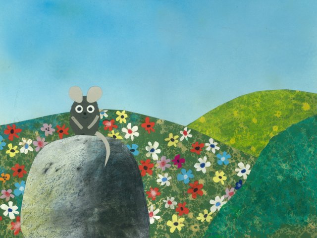 Photogramme du court métrage Frédéric du programme Le Petit monde de Léo. L'image représente une souris sur un rocher au premier plan, trois collines dont une recouverte de fleurs et le ciel à l'arrière-plan.